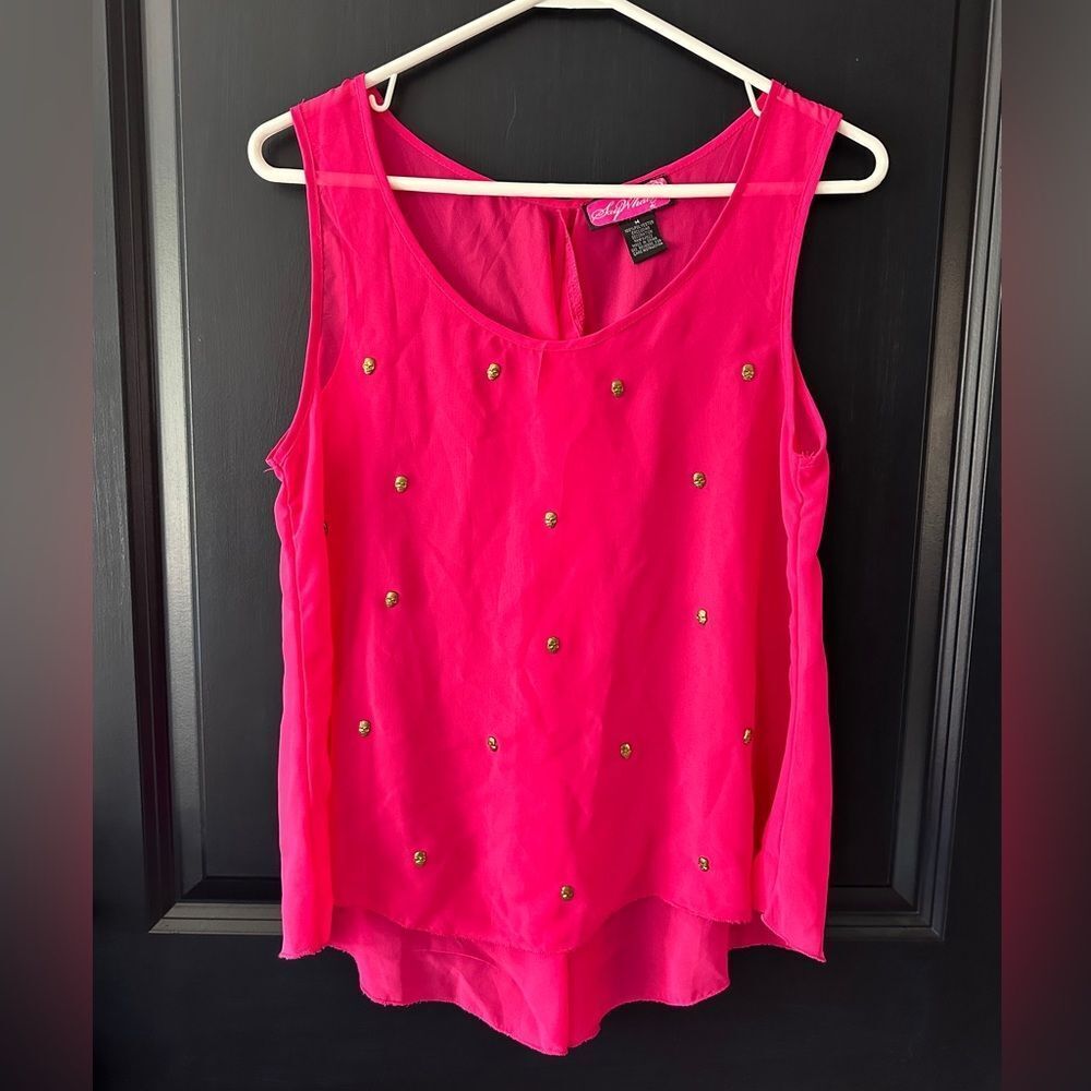 Hot pink sheer tank top with gold skulls on front. Medium